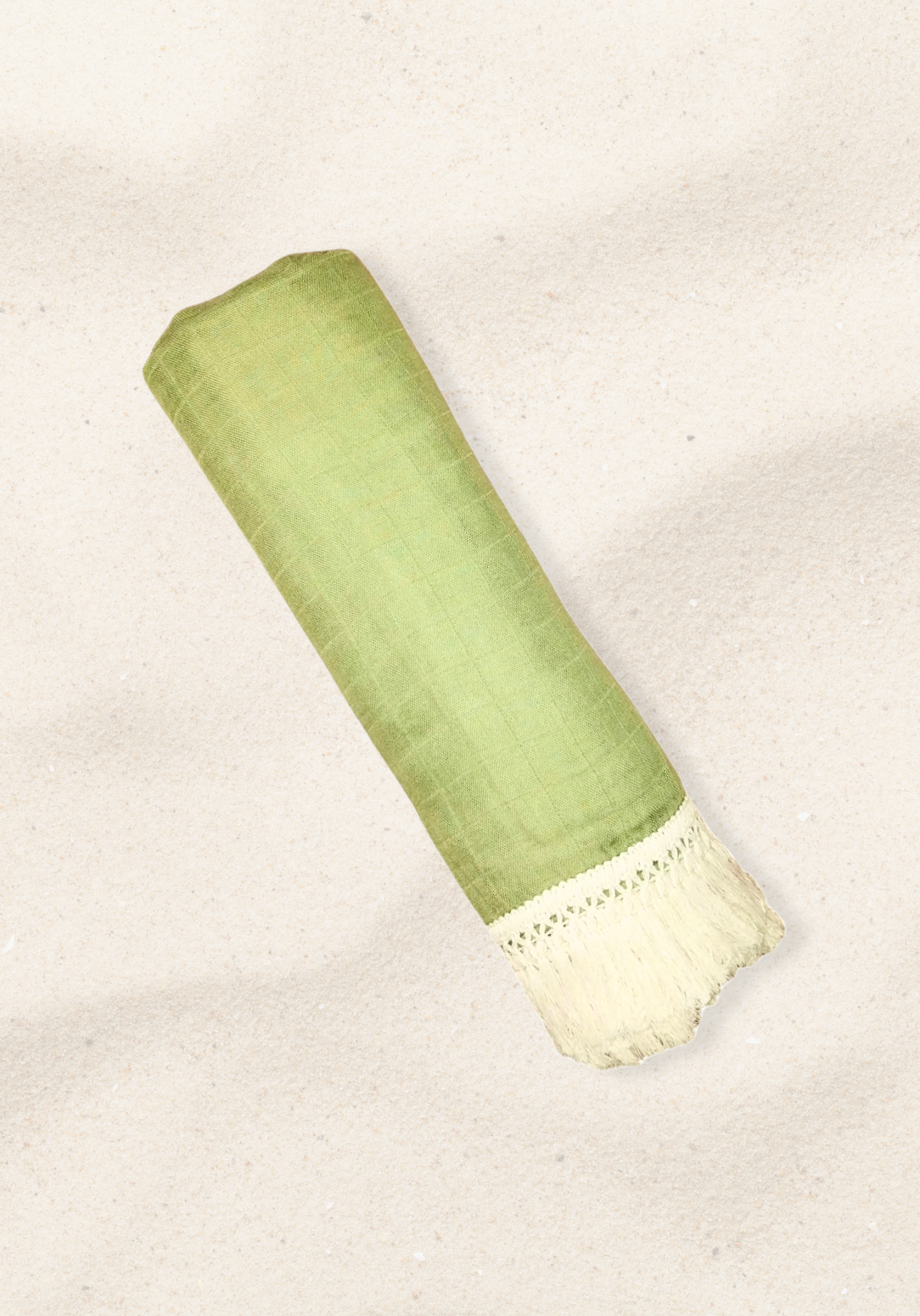 Soft green cotton baby blanket with ivory fringe, made from breathable cotton-bamboo fabric. Lightweight and cozy.