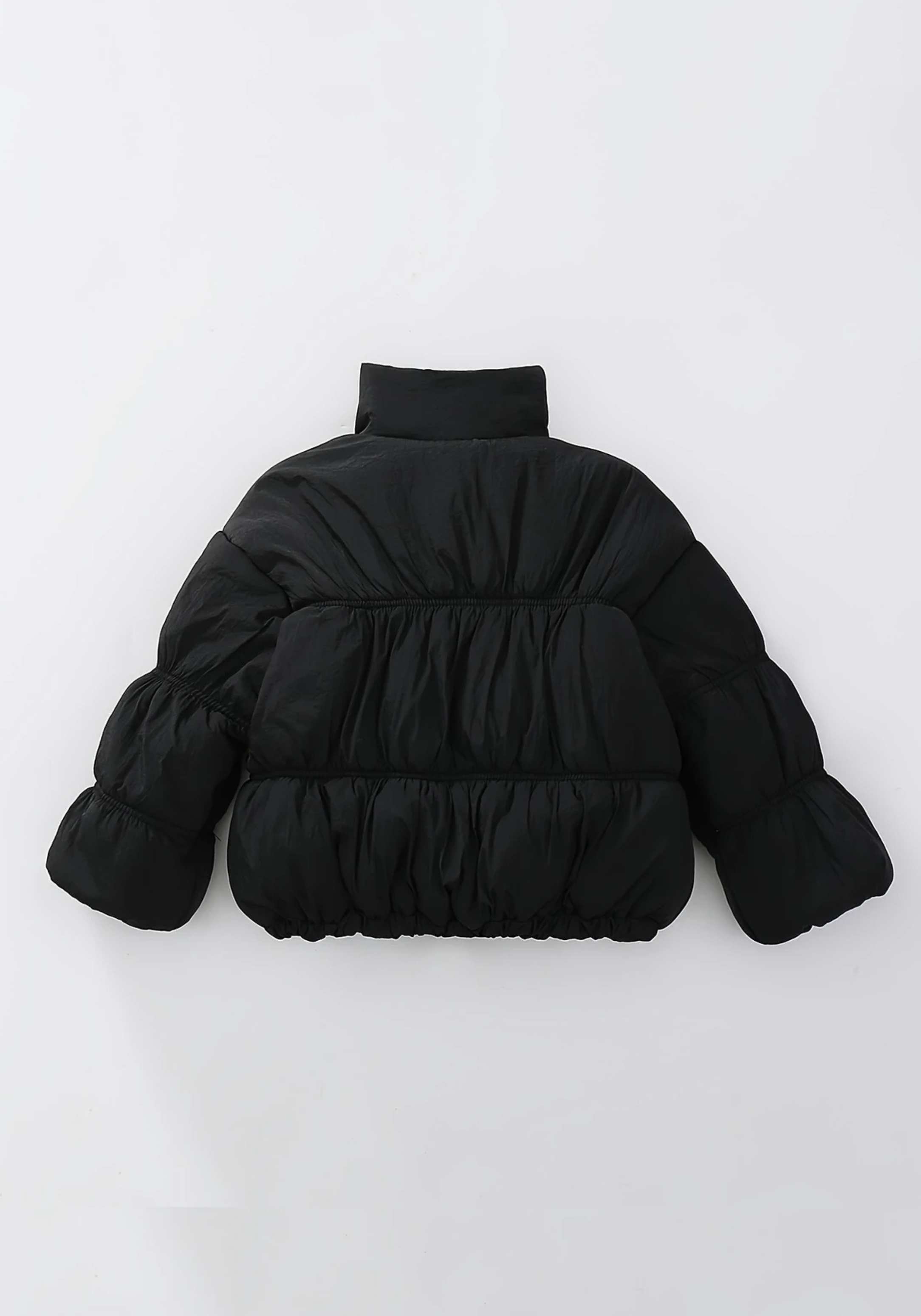 Back view of toddler black puffer jacket with ruched detailing and high collar