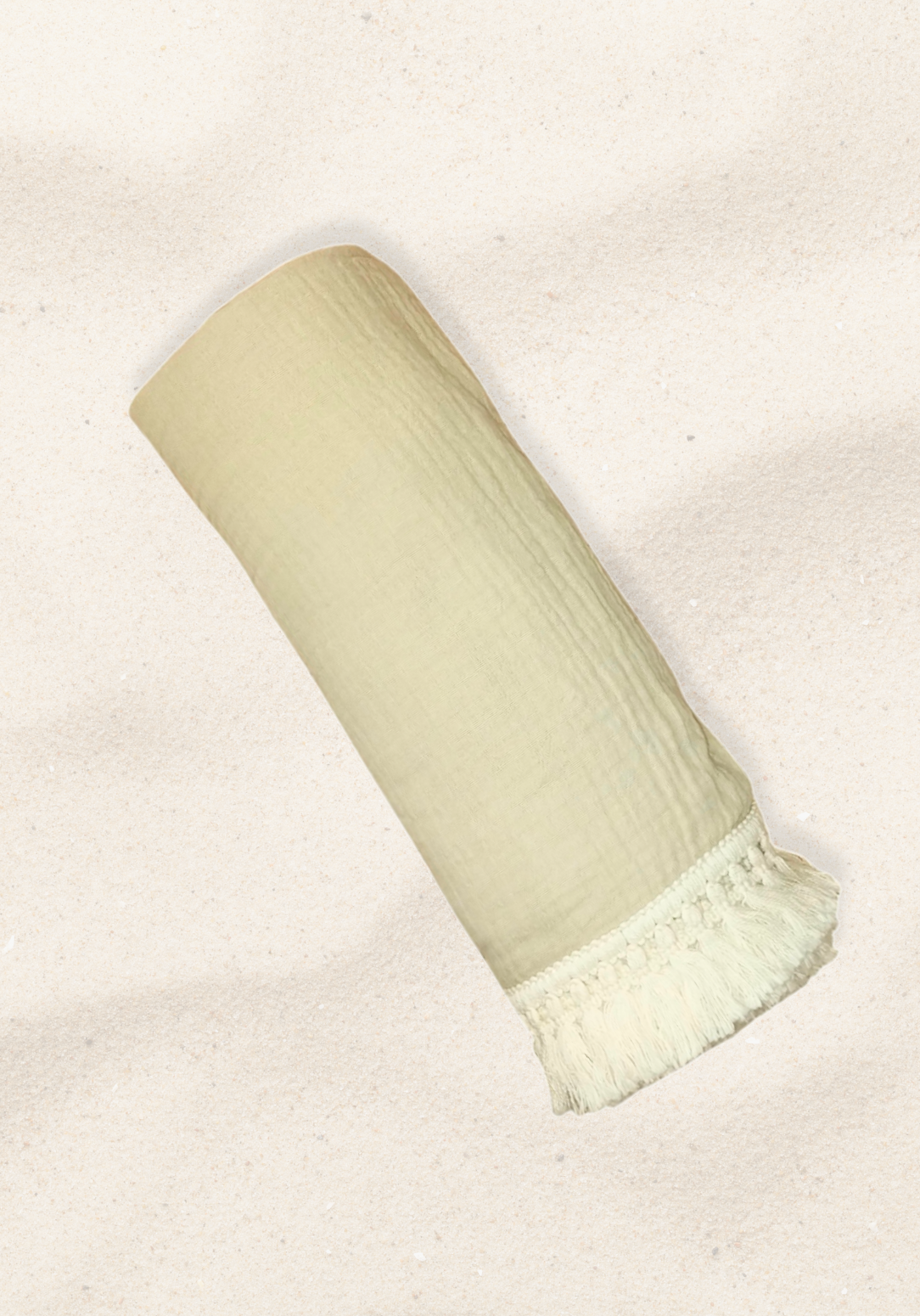 Neutral beige baby blanket with delicate fringe, crafted from cotton and bamboo for softness and breathability.