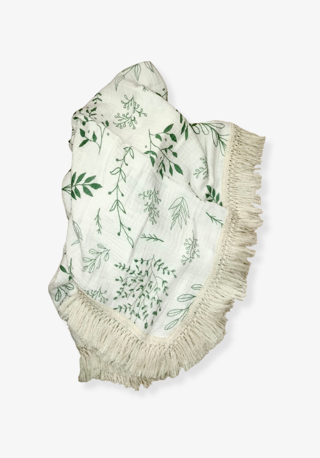 White cotton baby blanket with green botanical leaf print and boho-inspired fringe border. Naturally breathable.