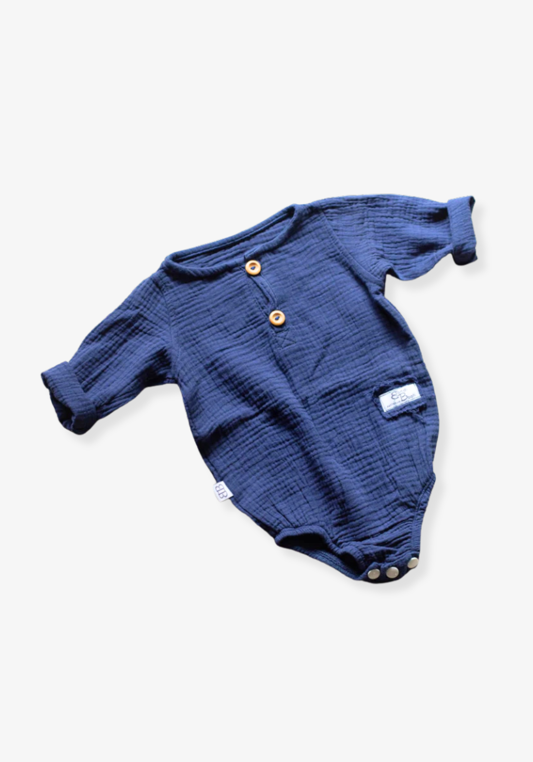 Long sleeve navy baby romper crafted from soft organic cotton with button-up front